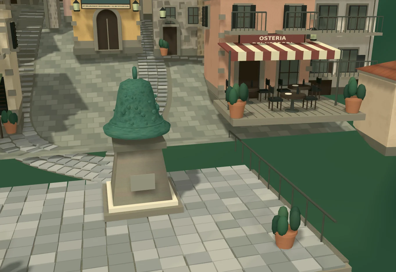 Modello artistico della campana con patina verde sul suo piedistallo nella piazza